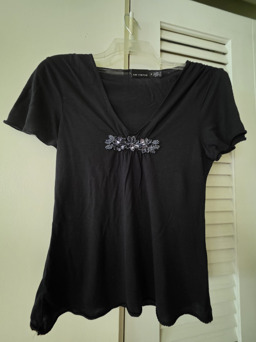 The Limited Black Short-Sleeve V-Neck Top with Beaded Floral Accent